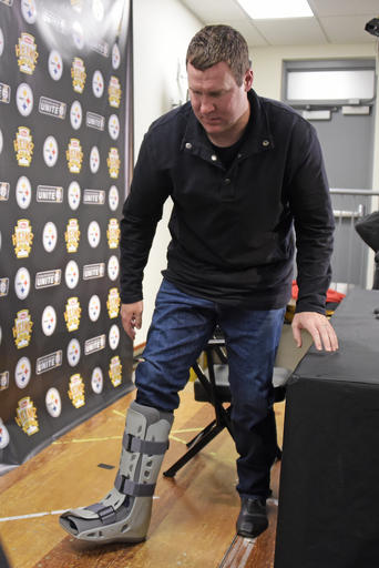 Pittsburgh Steelers quarterback Ben Roethlisberger (7) gets up after facing the media following an AFC wild-card NFL football game against the Miami Dolphins in Pittsburgh, Sunday, Jan. 8, 2017. (AP Photo/Fred Vuich)